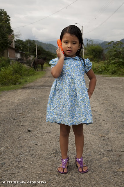 Jennifer Anahi, 3 and half years old, pretending to talk on her toy cell phone 